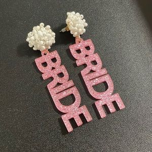 Sparkly pink BRIDE earrings with a white beaded post